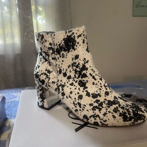 Size 10 women’s cow printed boots! Never worn!